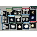 A COLLECTION OF UK SILVER PROOF COINS IN BOXES OF ISSUE, with certificates of authenticity from
