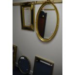 A MODERN GILT WOOD OVAL WALL MIRROR, together with three various other wall mirrors (4)