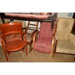 AN EDWARDIAN OAK ROCKING CHAIR WITH FOOTSLIDE, together with an oak armchair, an Edwardian inlaid