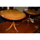 A PAIR OF REPRODUCTION MAHOGANY AND LEATHER TOPPED TRIPOD TABLES, on baluster pedestals with four