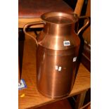 A COPPER MILK CHURN