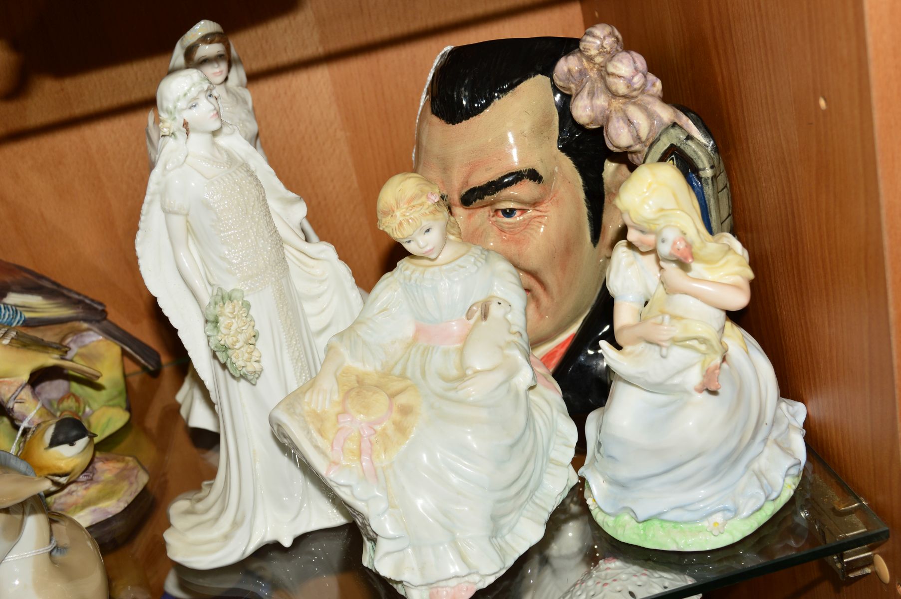 A ROYAL DOULTON CHARACTER JUG AND FOUR LIMITED EDITION COALPORT FIGURES, 'Count Dracula' D7053 (