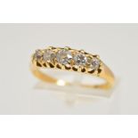 A LATE VICTORIAN 18CT GOLD FIVE STONE DIAMOND RING, designed as a graduated line of old cut diamonds