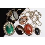THREE OVAL SHAPED GEM PENDANTS WITH THREE OVAL SHAPED BROOCHES, all set with minerals and gemstones,