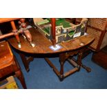 A MID 18TH CENTURY OVAL OAK GATELEG TABLE, two end drawers above wavy apron and baluster and block
