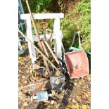 A PAIR OF WHITE PAINTED TRESSEL STANDS, together with various garden hand tools, a small child's