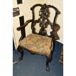 A 20TH CENTURY MAHOGANY CHIPPENDALE STYLE CARVER CHAIR, with heavily carved foliate decoration