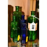 SIX EARLY 20TH CENTURY MOULDED GREEN AND BLUE GLASS POISON BOTTLES, one bearing original paper