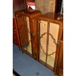 AN ORIENTAL WALNUT DOUBLE DOOR CHINA CABINET (key), with shibagama detail together with a matching