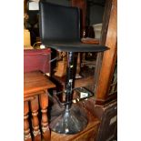 A MODERN CHROME SWIVEL BAR STOOL and a nest of three tables (nest situated next to Lot 1429) (2)
