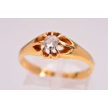 AN EDWARDIAN 18CT GOLD SINGLE DIAMOND RING, designed with an old cut diamond within an eight claw