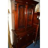A REPRODUCTION VICTORIAN STYLE GLAZED DOUBLE DOOR BOOKCASE above a single drawer and double cupboard