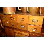 A PAIR OF GOLDEN OAK FOUR DRAWER INDEX CABINETS, width 49cm x depth 44cm x height 35cm (sd)