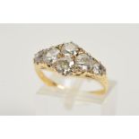 AN EARLY 20TH CENTURY DIAMOND DRESS RING, comprised six old Swiss cut diamonds measuring from 4.