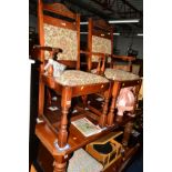 A SET OF SIX OLD CHARM OAK DINING CHAIRS including two carvers