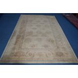 A MODERN GOLD GROUND RUG, 300cm x 200cm