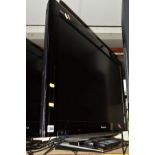 A PANASONIC 37'' LCD TV (two remotes) together with two glass top TV stands (3)