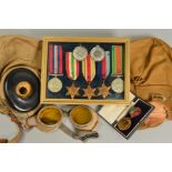 A FRAMED GROUP OF WWII MEDALS, to include 1939-45, Africa, Italy Stars War & Defence medal with