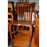 AN EARLY 20TH CENTURY OAK OFFICE ARMCHAIR