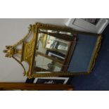 A LATE 20TH CENTURY GREEK STYLE GILT WOOD WALL MIRROR, 62cm x 117cm