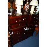A STAG MINSTRAL CHEST OF THREE LONG GRADUATING DRAWERS, together with a matching pair of bedside