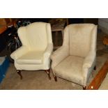A MULTI-YORK CREAM UPHOLSTERED WING BACK ARMCHAIR, together with an Edwardian mahogany winged