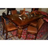 A REPRODUCTION OAK DRAW LEAF DINING TABLE OF RECTANGULAR FORM, chip carved edge to the frieze, on