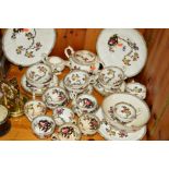 A VICTORIAN PART TEA SERVICE decorated with flowering blossoms on a white ground, painted pattern