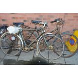 A VINTAGE B.S.A. GENTS BIKE, together with a vintage Raleigh bike (2)