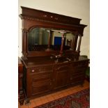 AN EARLY 20TH CENTURY ART NOUVEAU OAK MIRROR BACK SIDEBOARD, the top flanked by corinthian columns