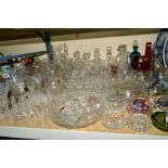 A GROUP OF GLASSWARE to include vases, jugs, drinking glasses, decanters, ships in bottles,