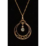 AN EDWARDIAN 9CT GOLD AQUAMARINE AND SPLIT PEARL OPENWORK PENDANT AND LATER CHAIN, the pendant of