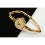 A LADIES 9CT GOLD CASED MECHANICAL WRISTWATCH, Arabic numerals to a silvered dial, subsidiary