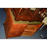 A BESPOKE 1960'S/70'S TEAK DESK with green vinyl top, three drawers and fall front cupboard door,