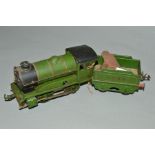 A HORNBY O GUAGE TIN PLATE TRAIN AND TENDER, 0-4-0, green LNER livery, with key