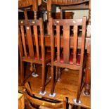 A SET OF FOUR OAK DINING CHAIRS together with a blue leatherette swivel tub chair and a teak