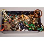 A BOX OF COSTUME JEWELLERY, to include bangles, necklaces etc