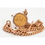 AN EARLY 20TH CENTURY 9CT GOLD ALBERT CHAIN SUSPENDING A MOUNTED SOVEREIGN, the Albert chain