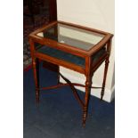 AN EARLY 20TH CENTURY MAHOGANY TABLE TOP DISPLAY CABINET OF SHAPED RECTANGULAR FORM, beaded edge