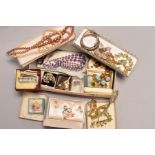 A BOX OF COSTUME JEWELLERY, to include two silver hinged bangles, a three pence coin bracelet, a