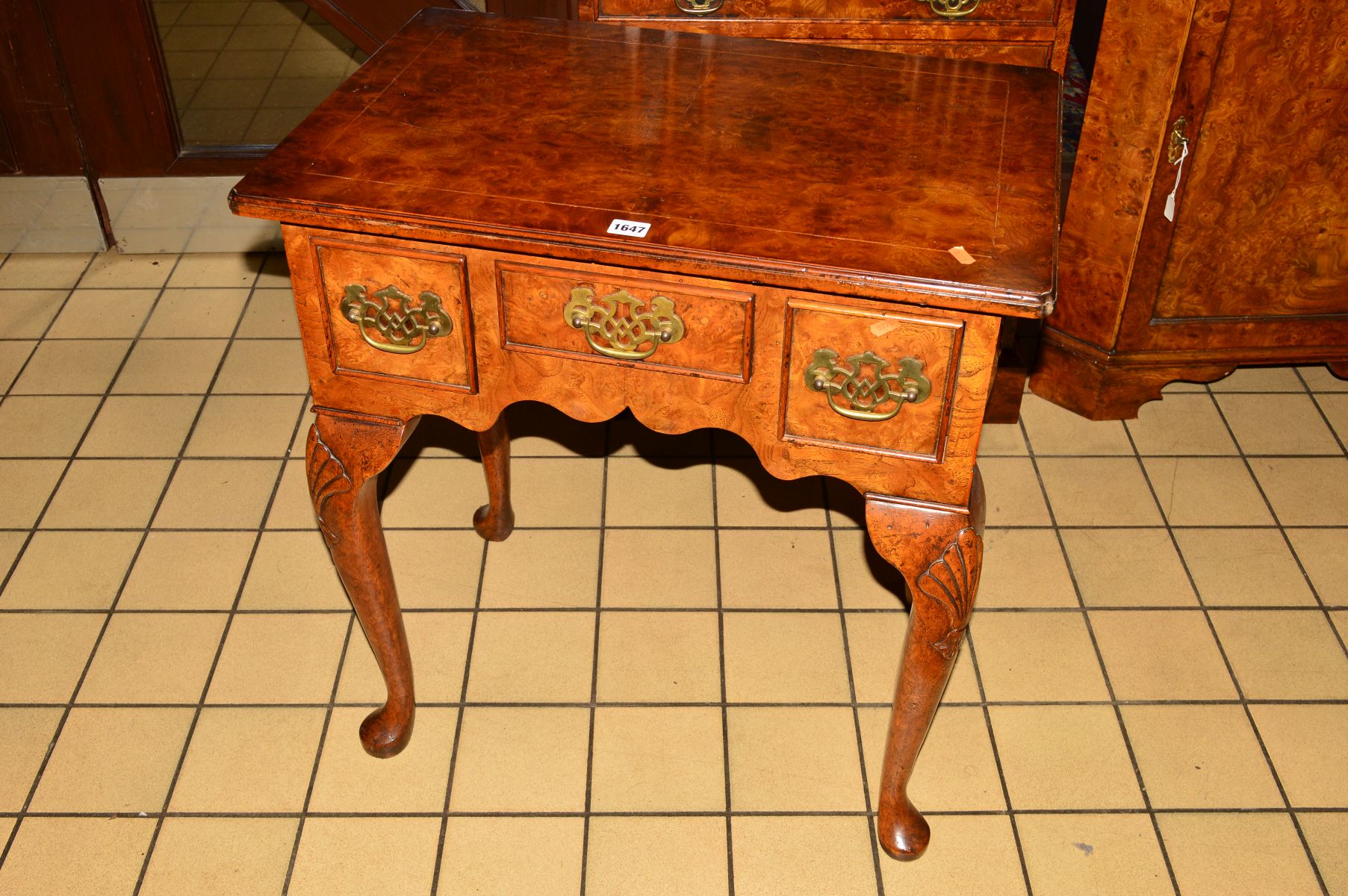 A REPRODUCTION BURR WALNUT AND INLAID SIDE TABLE OF GEORGE II STYLE, the rectangular top above three