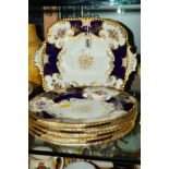 SIX COALPORT BLUE BAT WING PLATES, Z1002, to include a cake plate (cracked), and five plates,