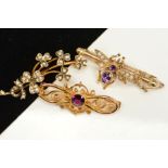 THREE BROOCHES, THE FIRST AN EARLY 20TH CENTUR 9ct gold foliate brooch set with split pearls, the