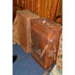 A VINTAGE TAN LEATHER SUITCASE stamped Army and Navy, London to strap, various travel labels width
