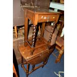 AN OAK BARLEY TWIST HALL TABLE with a single drawer and an oak drop leaf table (2)