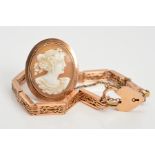 A BRACELET AND CAMEO BROOCH, a fancy link bracelet to the heart padlock clasp with safety chain,