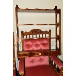 A REPRODUCTION MAHOGANY THREE TIER HANGING PLATE RACK with three various drawers