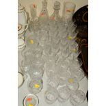 A GROUP OF CUT GLASSWARE ETC, to include a part suite of glasses (wines, liqueur, tumblers), two