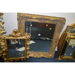 A LATE 20TH CENTURY RECTANGULAR FOLIATE GILT WOOD BEVELLED EDGE WALL MIRROR, 70cm x 80cm together