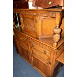 AN OAK DOUBLE DOOR SIDEBOARD and marriage court cupboard top section